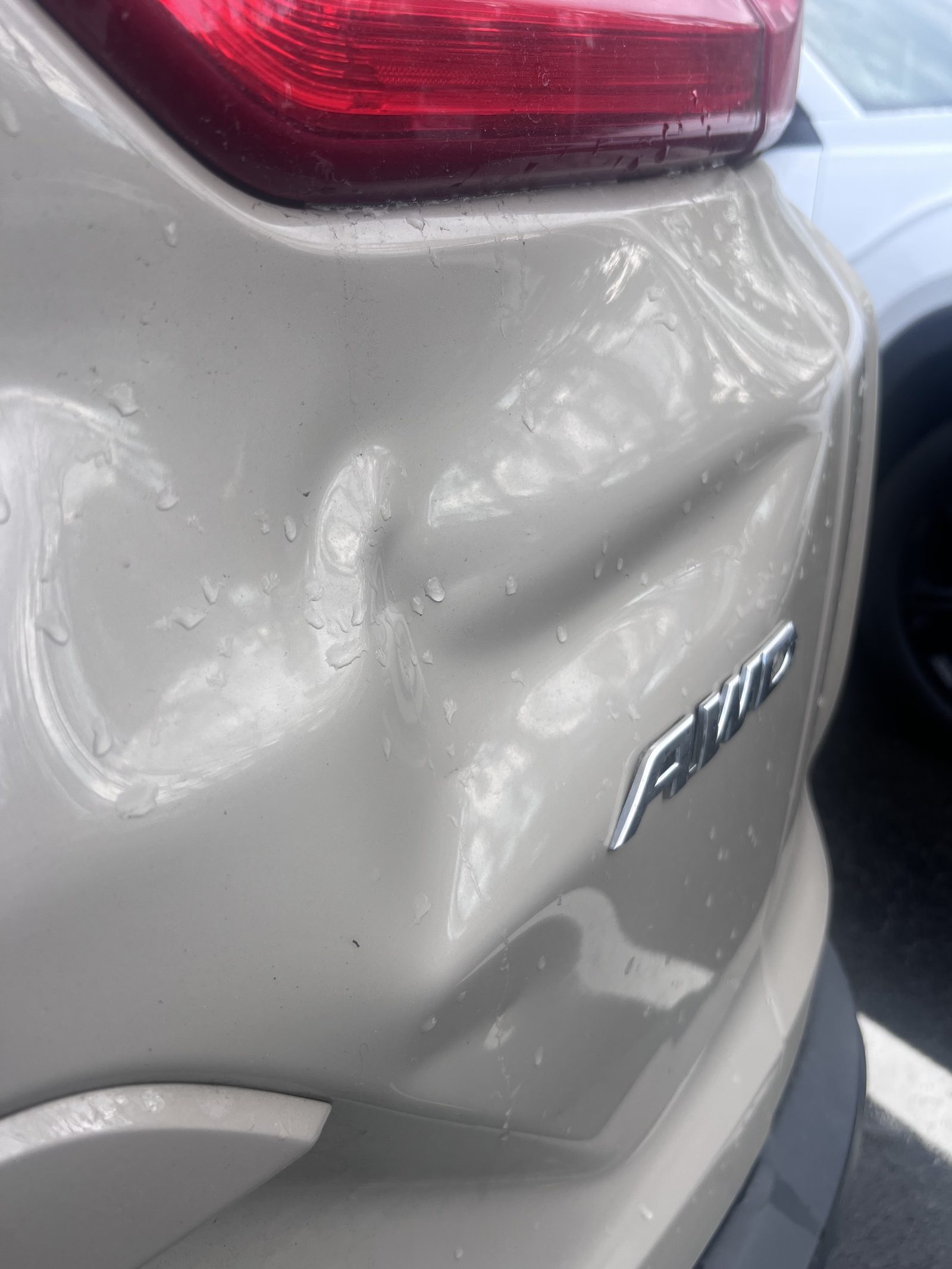 Dent Raptor Auto listing photograph
