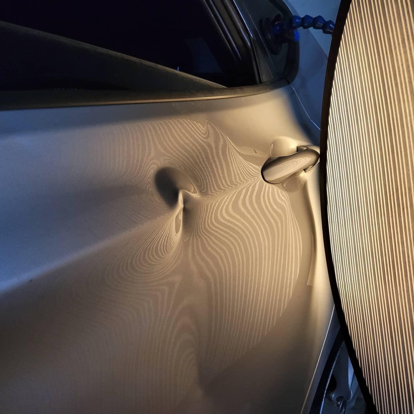Dent Raptor Auto listing photograph