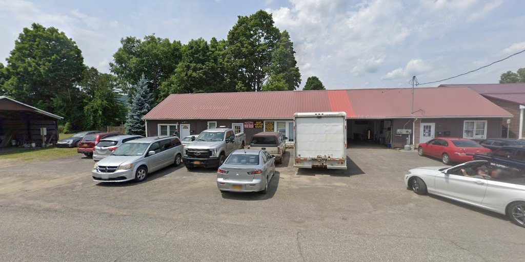 Google Street View of the used vehicle lot at 3 Miles Ave in Oneonta, New York